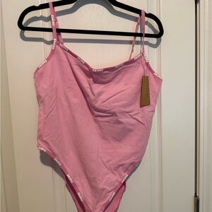 SKIMS Pink Kids One Piece Bodysuit